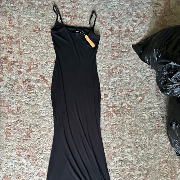 SKIMS Dresses & Skirts - Black sleeveless skims dress size medium BRAND NEW with tags